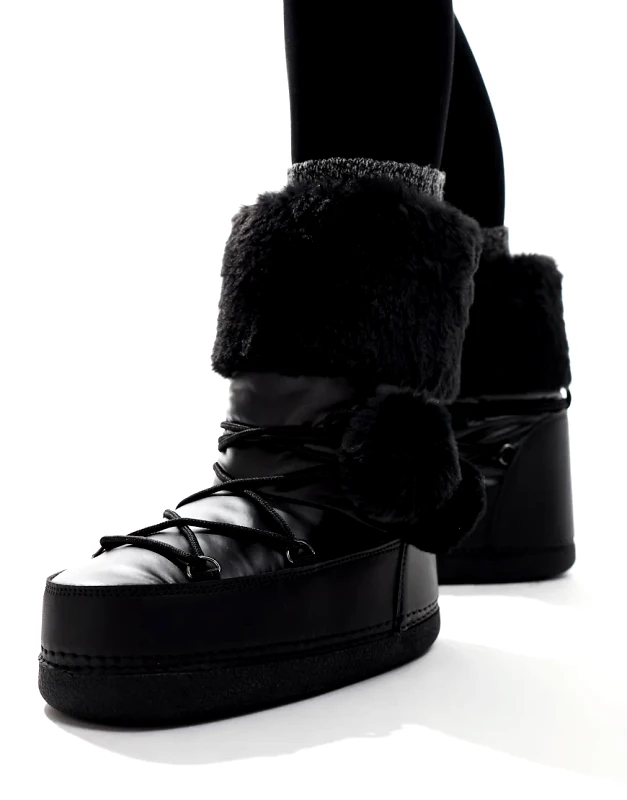 Public Desire Public Desire Aster snowboots with with fur trim and pom pom detail in Black