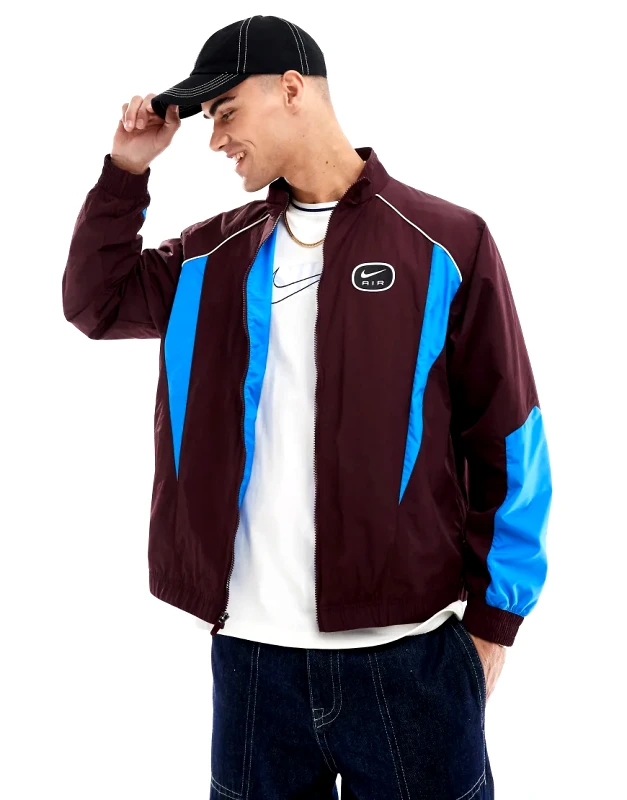 Nike Nike Swoosh Air woven tracktop in brown and blue
