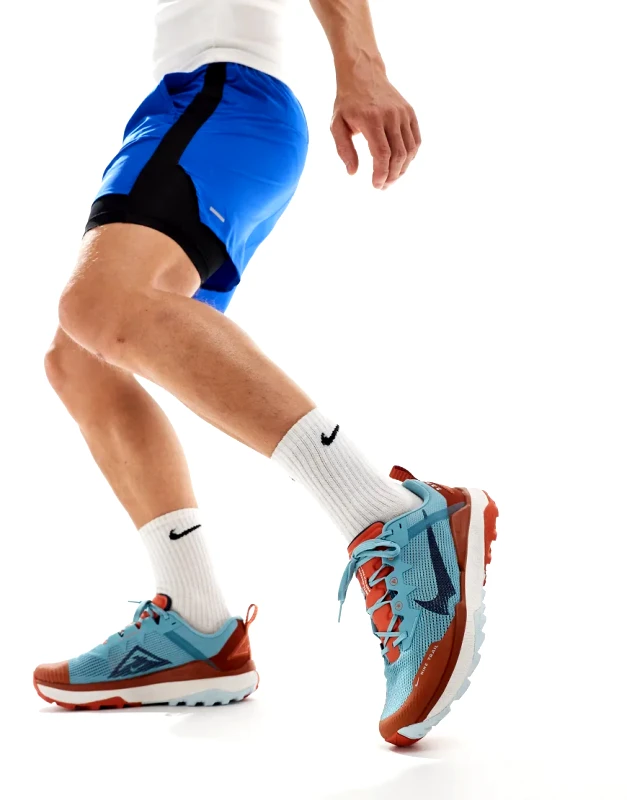 Nike Running Nike Running React Wildhorse 8 trainers in light blue and orange