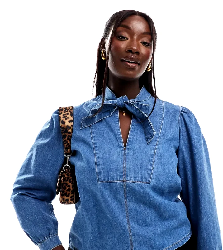 ASOS Curve ASOS DESIGN Curve denim bow neck shirt in mid blue