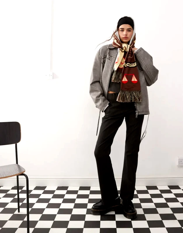 Collusion COLLUSION low rise pinstripe kick flare trousers in black-Grey
