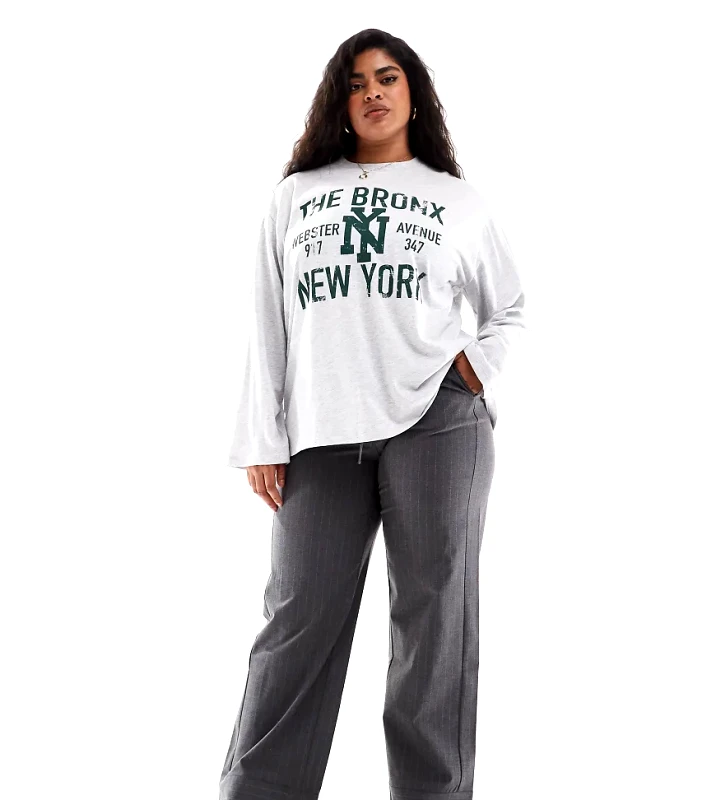 ASOS Curve ASOS DESIGN Curve long sleeve skater t-shirt with bronx graphic in ice marl-Grey