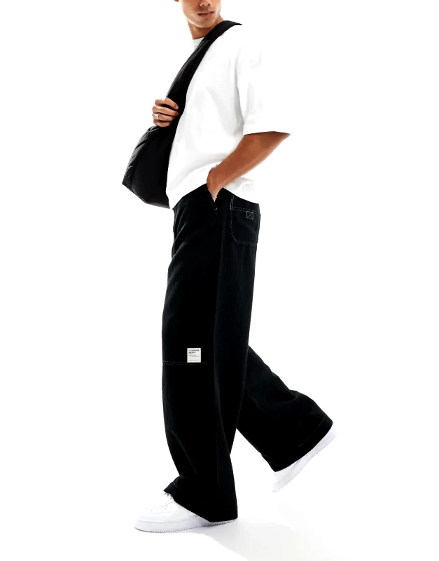 ASOS DESIGN ASOS DESIGN super baggy corduroy trouser with contrast stitch in black