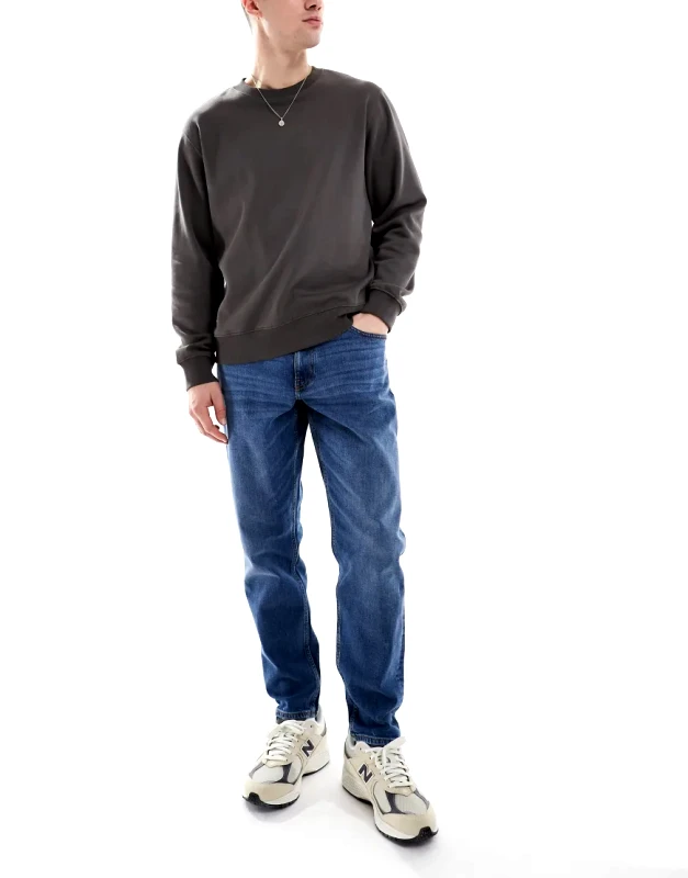 ASOS DESIGN ASOS DESIGN stretch tapered jeans in mid wash-Blue