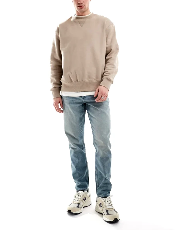 ASOS DESIGN ASOS DESIGN tapered jeans with in light wash blue