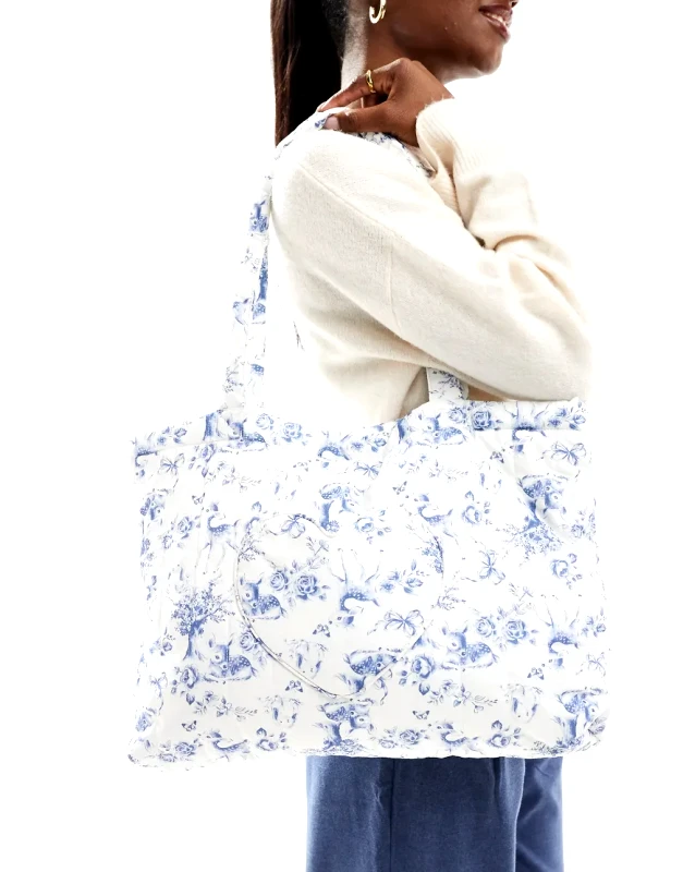 Hollister Hollister large sleepover bag with heart detail in blue floral print