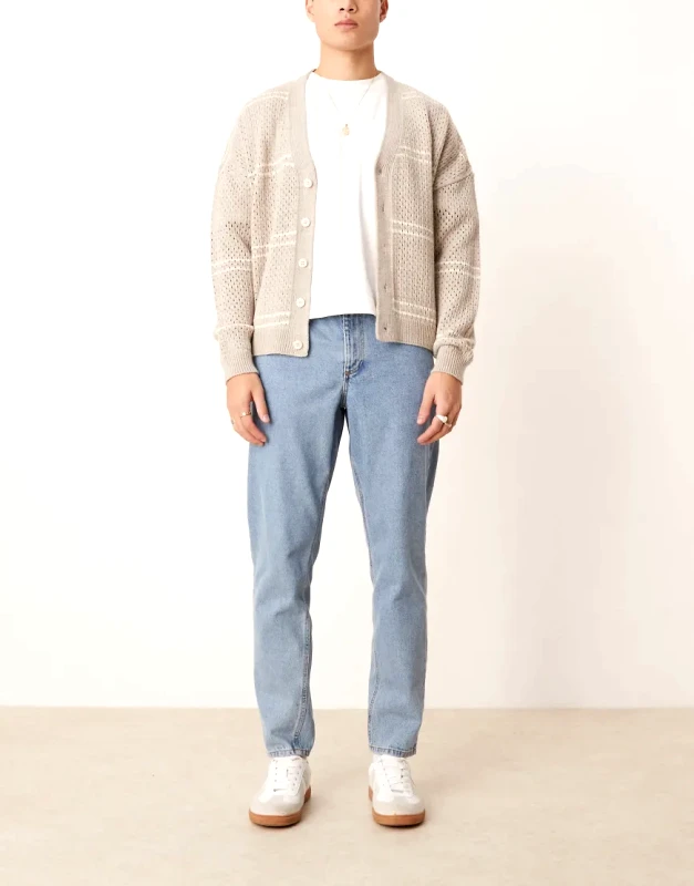 ASOS DESIGN ASOS DESIGN tapered fit jeans in mid wash blue