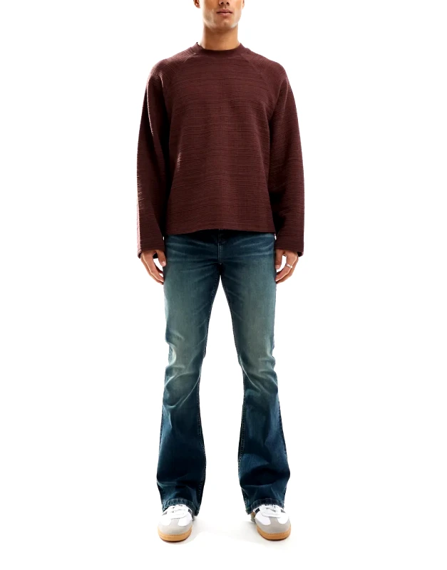 ASOS DESIGN stretch flare jeans in mid blue with green tint φωτογραφία