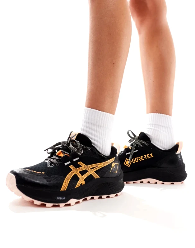 Asics Asics Gel-Trabuco 12 GTX waterproof trail running trainers in black and orange