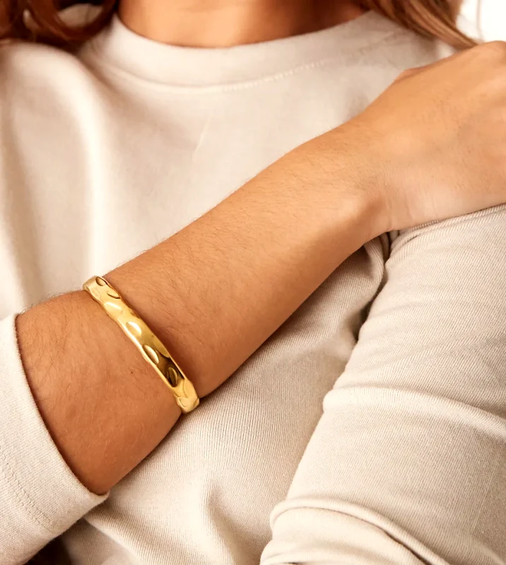 LOST SOULS Lost Souls stainless steel 18ct gold plated hammered cuff bracelet