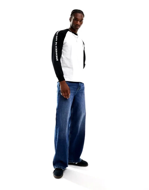 AAPE BY A BATHING APE® Aape by A Bathing Ape raglan long sleeve t-shirt in white & black-Neutral