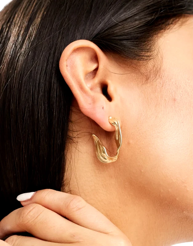 SVNX SVNX half moon gold hoops with melted metal detail