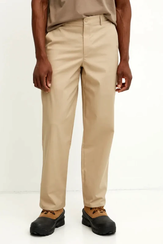 New Balance Παντελόνι New Balance Athletics Standard Pant 30" χρώμα: μπεζ, MP43560SOT