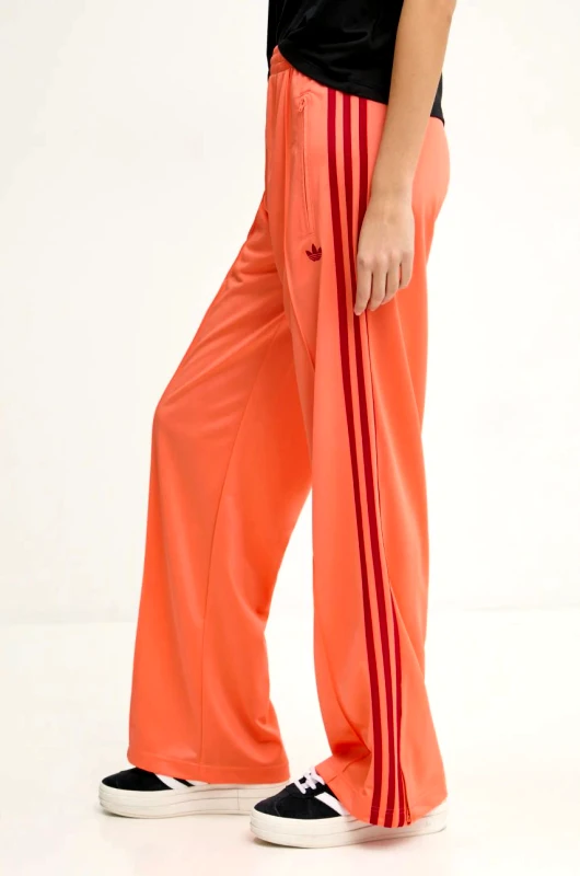 adidas Originals Παντελόνι adidas Originals Firebird χρώμα: πορτοκαλί, JP2309